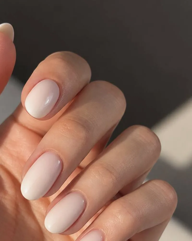 Oval nails in milky white gel