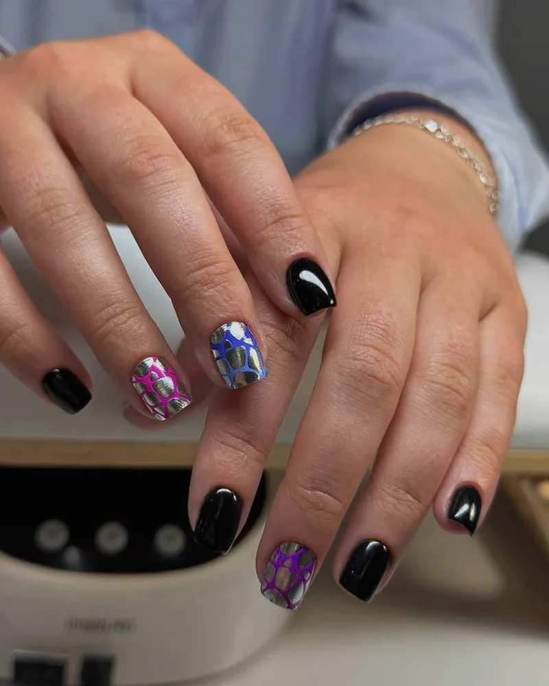Black nails with chrome accent nails