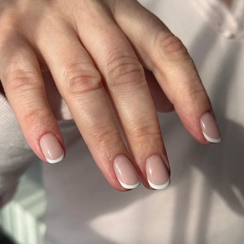 Short square nails with a thin white French tip