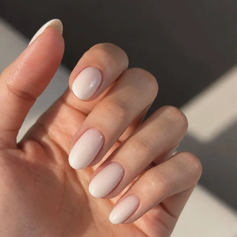 Oval nails in milky white gel